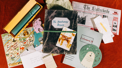 Two people playing The Vandermist Dossier mystery game together at home